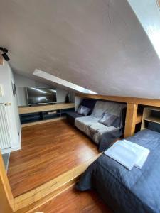 Posteľ alebo postele v izbe v ubytovaní Apartamenty pod Skosami