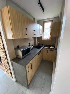 Kuchyňa alebo kuchynka v ubytovaní Apartamenty pod Skosami