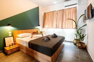 Posteľ alebo postele v izbe v ubytovaní Unique Experience Apartment’s
