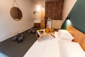 Posteľ alebo postele v izbe v ubytovaní Unique Experience Apartment’s