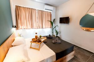 Televízia a/alebo spoločenská miestnosť v ubytovaní Unique Experience Apartment’s