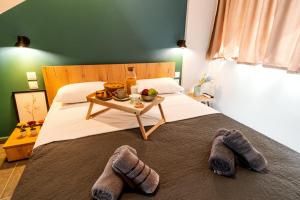Posteľ alebo postele v izbe v ubytovaní Unique Experience Apartment’s