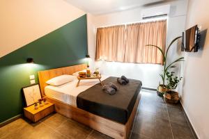 Televízia a/alebo spoločenská miestnosť v ubytovaní Unique Experience Apartment’s