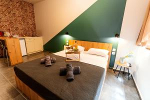 Posteľ alebo postele v izbe v ubytovaní Unique Experience Apartment’s