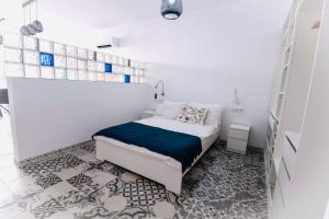 Cama o camas de una habitación en Arenas beach