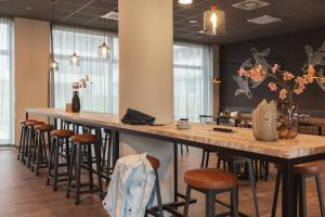 A restaurant or other place to eat at Holiday Inn - the niu Tab Dusseldorf Main Station by IHG