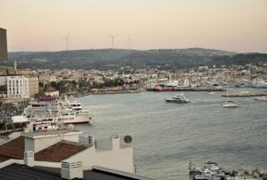 a view of a harbor with boats in the water at Sahil Butik Otel in Cesme