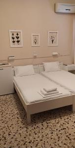 Cama o camas de una habitación en Icarus Rooms