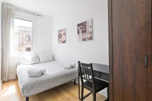 Posteľ alebo postele v izbe v ubytovaní Stay U-nique Apartments Urgell