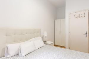 Posteľ alebo postele v izbe v ubytovaní Stay U-nique Apartments Urgell