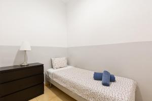 Posteľ alebo postele v izbe v ubytovaní Stay U-nique Apartments Urgell