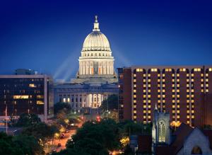 a view of the capitol building at night at The Madison Concourse Hotel in Madison