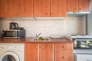 Kuchyňa alebo kuchynka v ubytovaní El sueño de Zante City Center Apartments