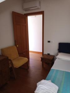 Posteľ alebo postele v izbe v ubytovaní Villa Grande