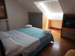 Posteľ alebo postele v izbe v ubytovaní Villa Grande