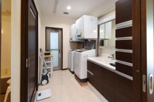 A kitchen or kitchenette at SEAVIEW VILLAS&HOUSE ONNA