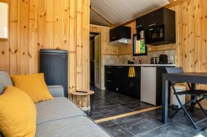 Kuchyň nebo kuchyňský kout v ubytování Les Petits Ecrins - Chalets avec spas privatifs