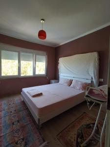 Posteľ alebo postele v izbe v ubytovaní Mia's Sea View Apartment