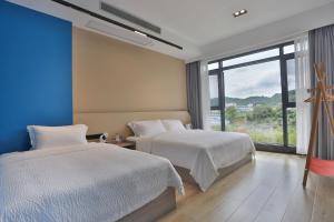 Heaven's Gate Home Stay --free pick up service--panoramic view of Tianmen Mountain客房内的一张或多张床位