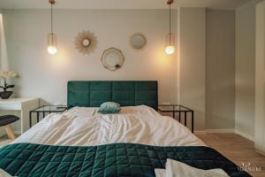 Posteľ alebo postele v izbe v ubytovaní Apartament Silence Karpatia Resort Nefryt