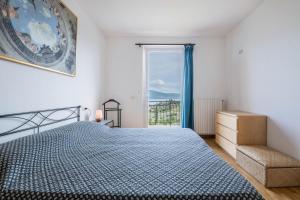 Postel nebo postele na pokoji v ubytování Al Agave sopra + 24 fotografií