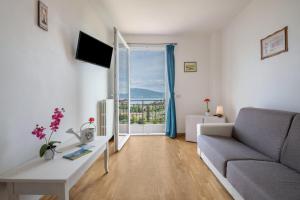 TV a/nebo společenská místnost v ubytování Al Agave sopra