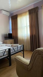Μια τηλεόραση ή/και κέντρο ψυχαγωγίας στο ALEM Hotel