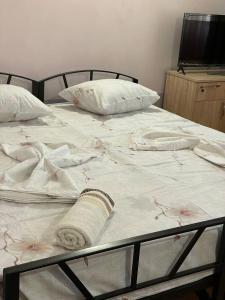 Ένα ή περισσότερα κρεβάτια σε δωμάτιο στο ALEM Hotel