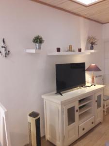 TV a/nebo společenská místnost v ubytování Casa BBarbate + 3 fotografie