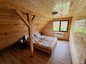 A bed or beds in a room at Casa Alexia