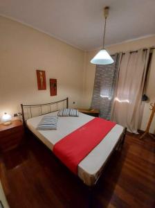 Ένα ή περισσότερα κρεβάτια σε δωμάτιο στο Villa Zisi