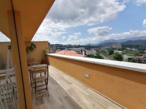 a balcony with a view of a city at BIKEINN in Vouzela