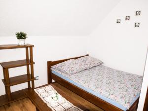 Ένα ή περισσότερα κρεβάτια σε δωμάτιο στο Agronoclegi w Bieszczadach ,,Na Równi"