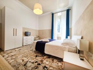 Ліжко або ліжка в номері La Dolce Vita Guesthouse