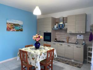 Kuchyň nebo kuchyňský kout v ubytování Casa Gessica + 44 fotografií