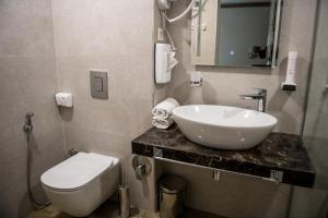 Koupelna v ubytování Arletti Hotel