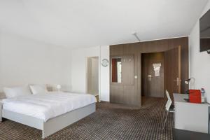 Neuchâtel City Hôtel 객실 침대