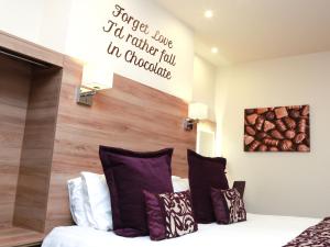 Postel nebo postele na pokoji v ubytování The Chocolate Box Guest House