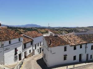 a view of a village with white buildings at Casa Romántica con Sauna privada Eternal Rural in Jimena de la Frontera