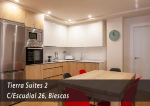 A kitchen or kitchenette at Tierra Boutique, Tierra Suites y Tierra Valles Apartamentos