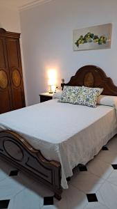 A bed or beds in a room at Casa El Villa