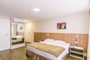 Hotel 7 Itajaí房間的床