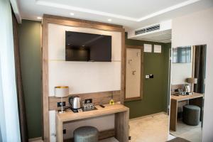 Kuchyň nebo kuchyňský kout v ubytování Arletti Hotel
