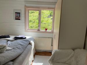 En eller flere senge i et værelse på Icelandic Lake House