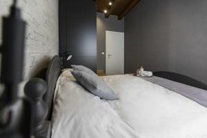 A bed or beds in a room at Casa Juliana Turismo