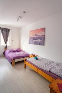Postel nebo postele na pokoji v ubytování Villa Zarra