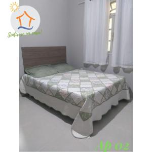 a bedroom with a bed in a room at Ap Privativo Brisamar, 10min da praia - Sentir-se em casa! in Vila Velha