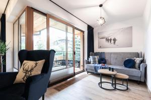 Posedenie v ubytovaní Apartamenty Koziniec