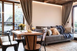 Posedenie v ubytovaní Apartamenty Koziniec