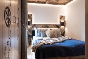 Posteľ alebo postele v izbe v ubytovaní Apartamenty Koziniec